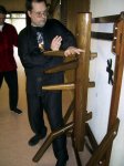 Grandmaster Rien Bul training on the wooden dummy.